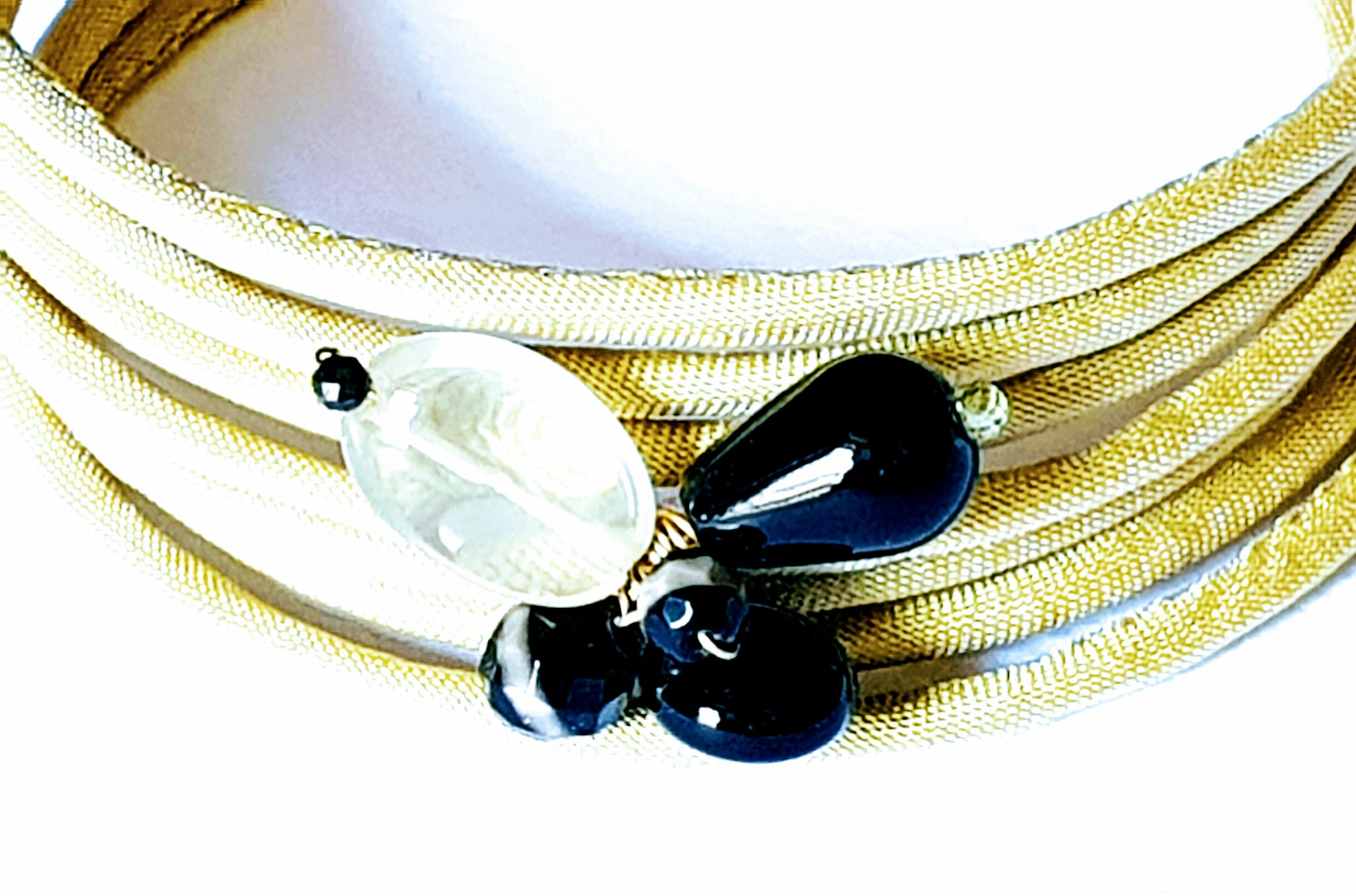 Spiral multi-wire rigid silk bracelet with natural stones