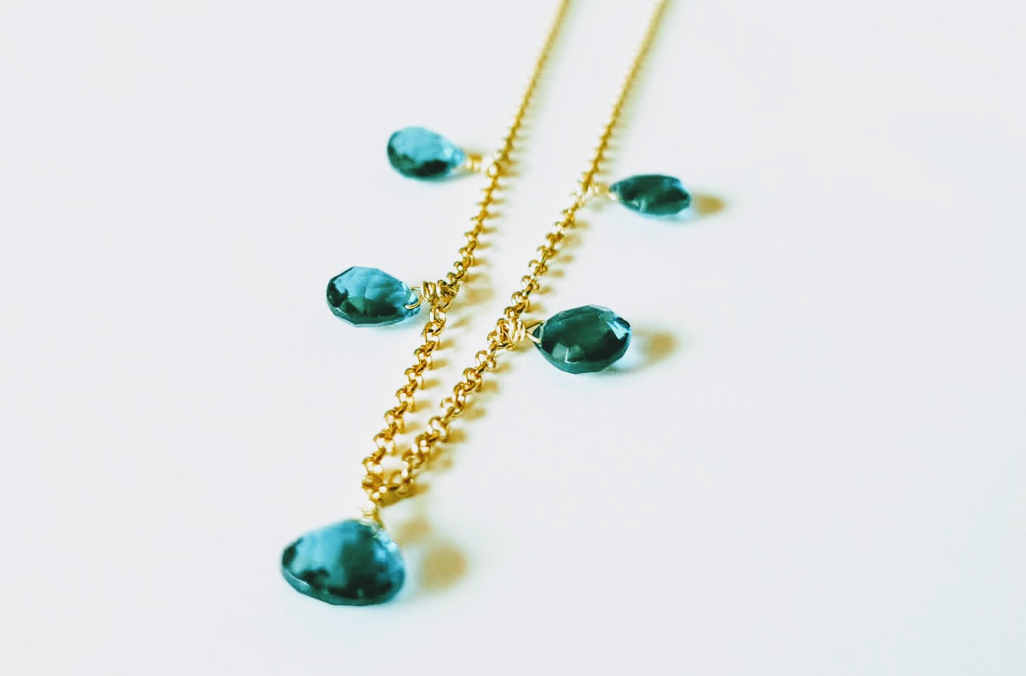 Golden silver necklace with London topaz